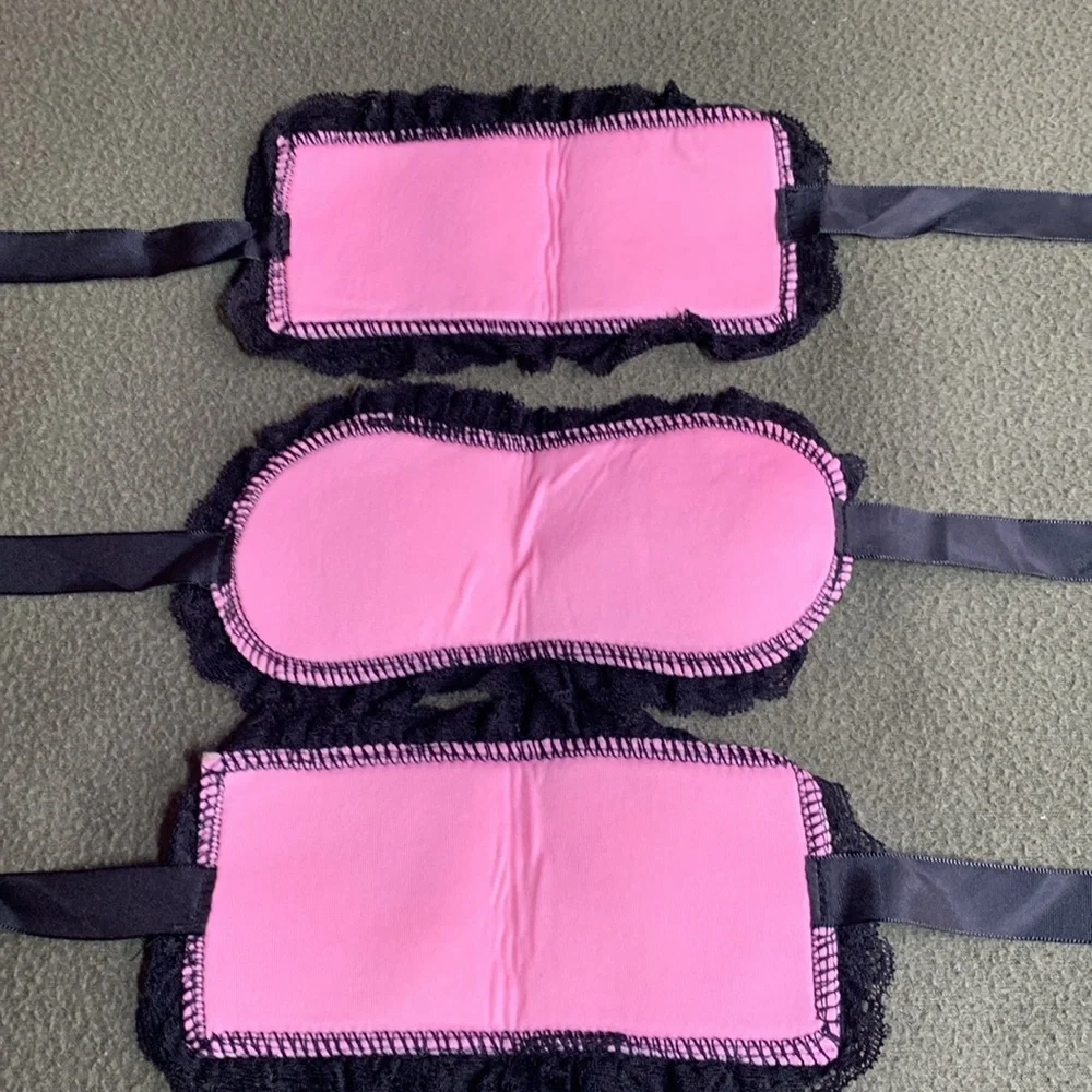 New set of 3 pink and black lace blindfolds. Never used. See pictures for size.